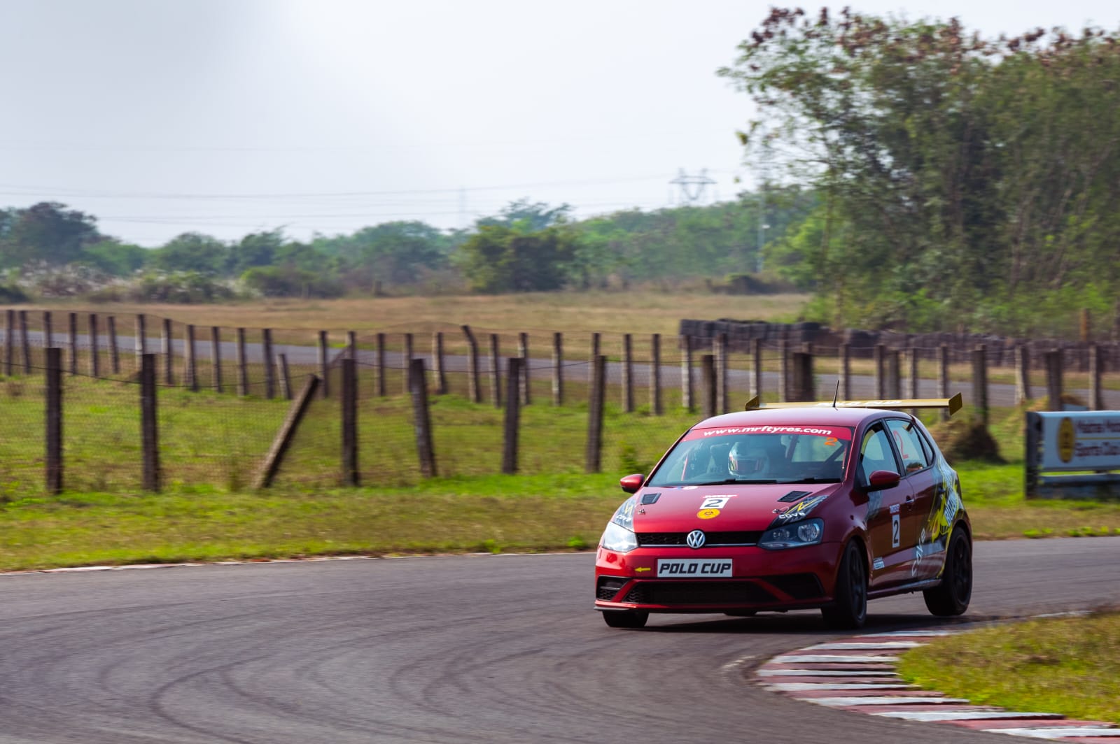 Avi turning his red Polo Cup car into a corner